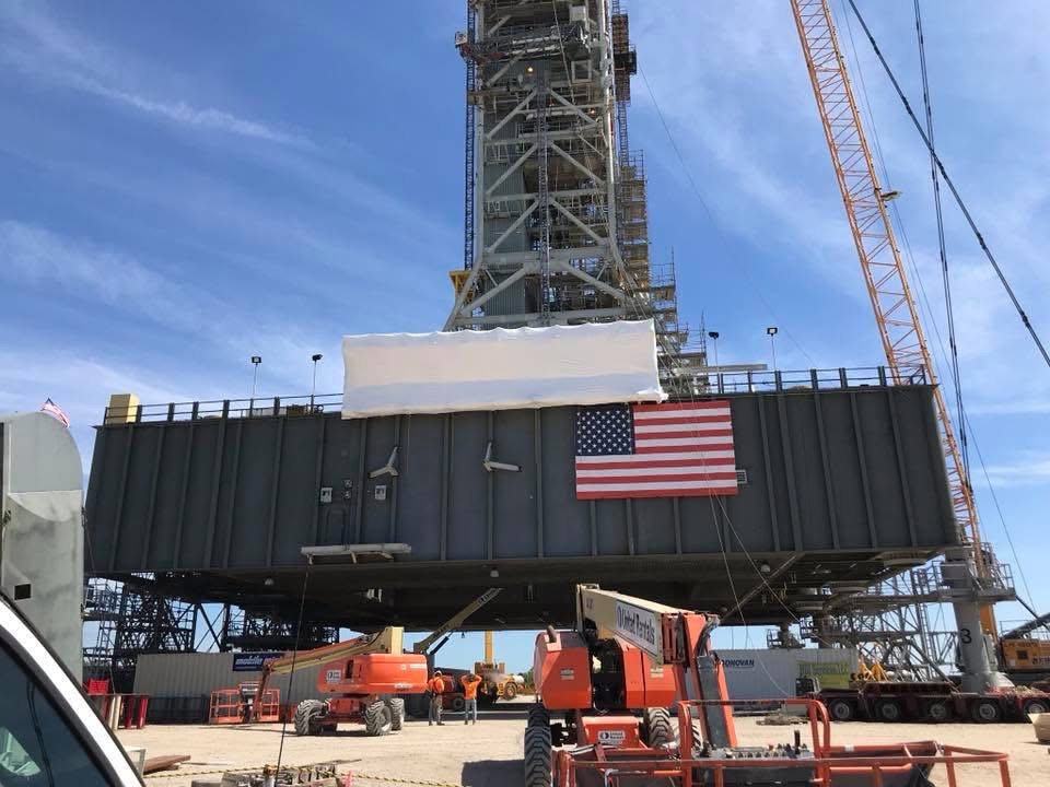 Large industrial construction equipment protected with shrink wrap